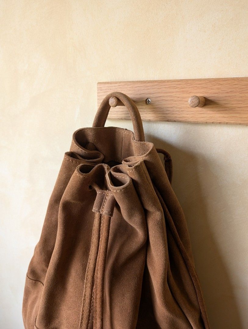 Mango Suede Drawstring Backpack (Category: Backpacks) located in Singapore. Submitted by moonbound (Listing ID 1353296492, Image 2). Description: Suede material. Feels premium and high quality. Bag is perfect for festivals.