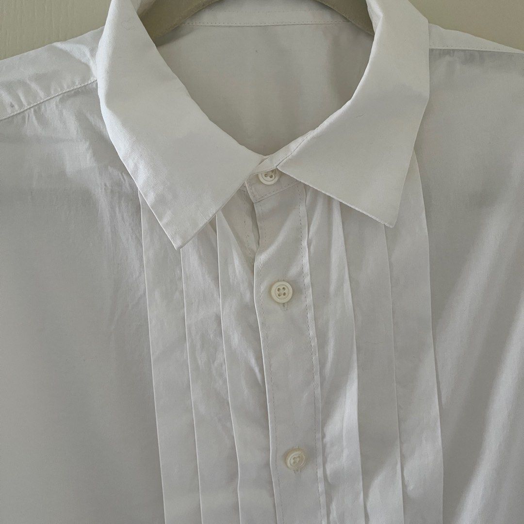 Pleated Dress Shirt (Category: Formal Shirts) located in Makati City. Submitted by slow_dive (Listing ID 1353382763, Image 3). Description: no issues cotton material pleated details in the front great alternative to the white plain polo DIMENSIONS 📏 W 24“ X L 28“ please don’t hesitate to message me for related inquiries @noir_collectives you may follow my ig page for more garments and proof of sales 🛵 lalamove or any motorcycle courier service 