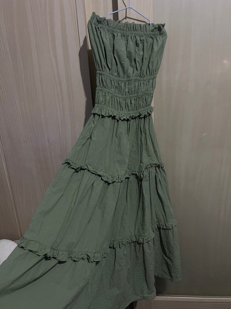 Sage Green Maxi Dress (Category: Dresses) located in Makati City. Submitted by Gabriella (Listing ID 1353323419, Image 2). Description: Used only for fitting. Color may appear different due to lighting. Last price posted. For delivery only RFS: Decluttering. Bought it on tiktok shop for a wedding but ended up wearing different dress..