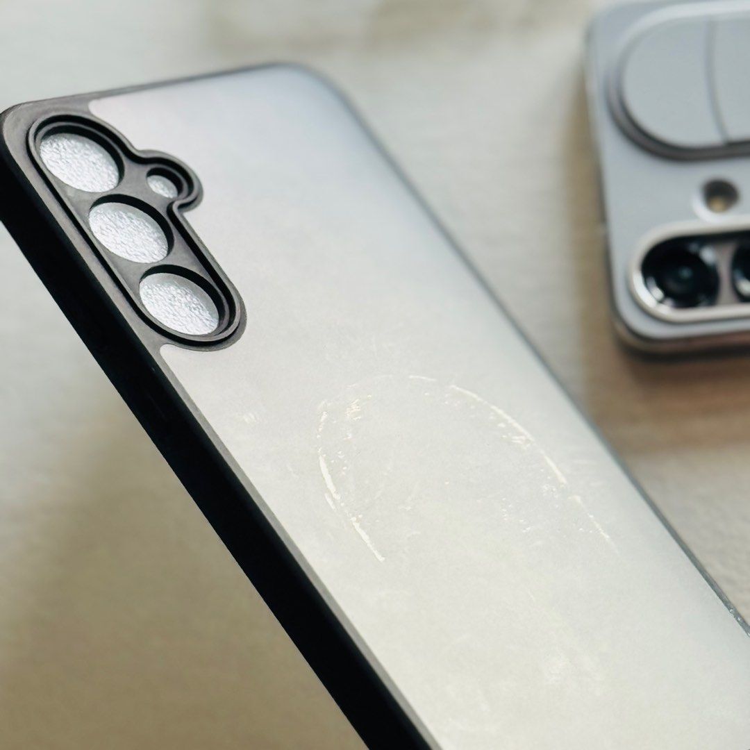 SAMSUNG A55 MINIMALIST PHONE CASE (Category: Cases & Sleeves) located in Quezon City. Submitted by projectdeclutter.ph (Listing ID 1353228651, Image 3). Description: Brand: LINKEE Description: MINIMALIST MATTE BLACK ANTI-SCRATCH ANTI-FINGERPRINT 2.4 m DROP PROTECTION Material: SOFT SILICONE TPU EDGE; HARD PC BACK Condition: 8/10 (with visible phone stand marking on the back panel) Price: 99.00.