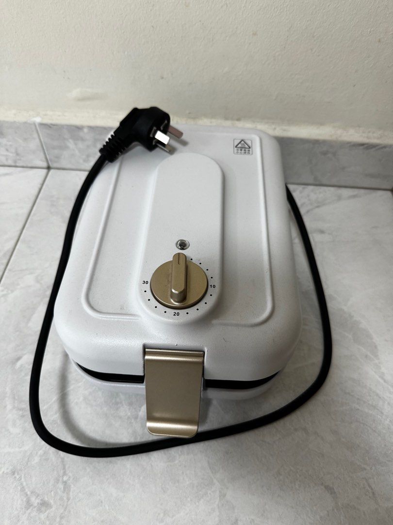 Waffle maker (Category: Other Kitchen Appliances) located in Singapore. Submitted by ckncs (Listing ID 1353281981, Image 5). Description: All info are provided in the photo…only have waffle design..