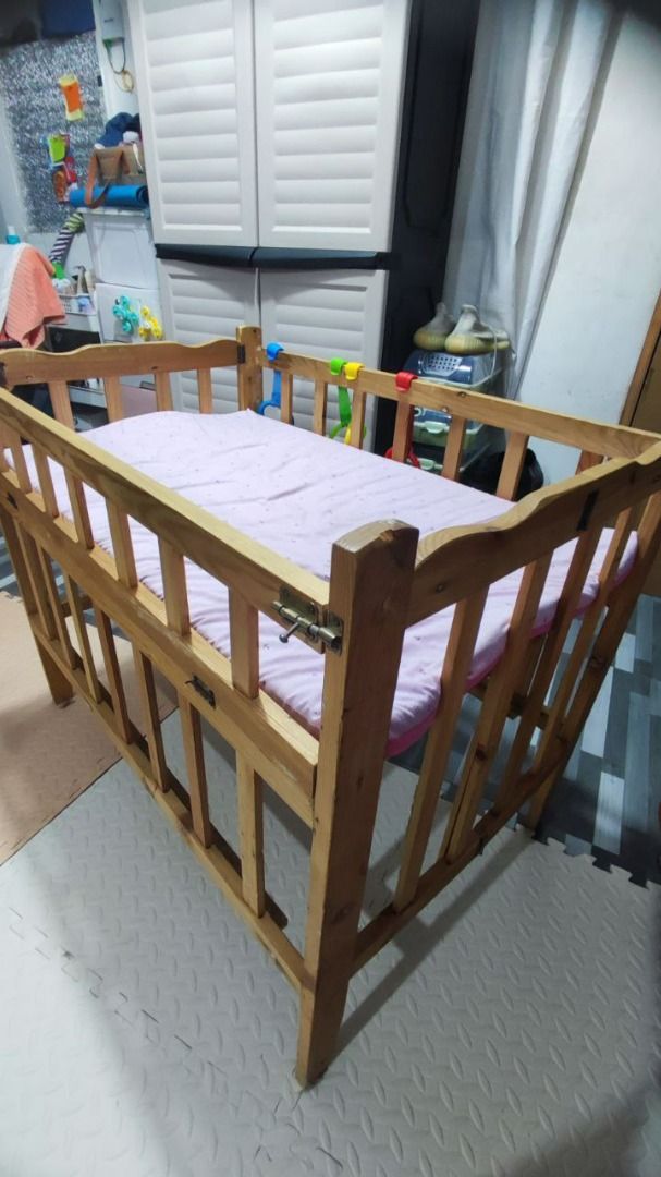 2 in 1 wooded crib/kuna - adjustable and dropside (Category: Cots & Cribs) located in Caloocan City. Submitted by charjessac75348 (Listing ID 1353457597, Image 3). Description: For sale: preloved wooden crib/ Kuna Adjustable and dropside na po With uratex foam ndn PRICE: 1,000 - negotiable pa po LOCATION: Bigte, Norzagaray Bulacan .