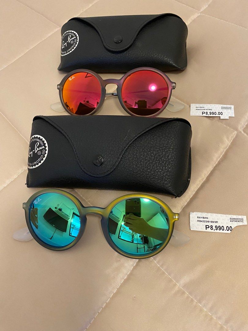 AUTHENTIC RAY-BAN YOUNGSTER ROUND (Category: Sunglasses & Eyewear) located in Davao. Submitted by bee_pee (Listing ID 1353508923, Image 2). Description: AUTHENTIC & BRANDNEW! With Case and Wiper With price tag No Box and Paperbag Bought in US during clearance sale 1. RAY-BAN RB4222/6169/3R Green Original Price: ₱8,990 2. RAY-BAN RB4222/6167/6Q Red Original Price: ₱8,990 .