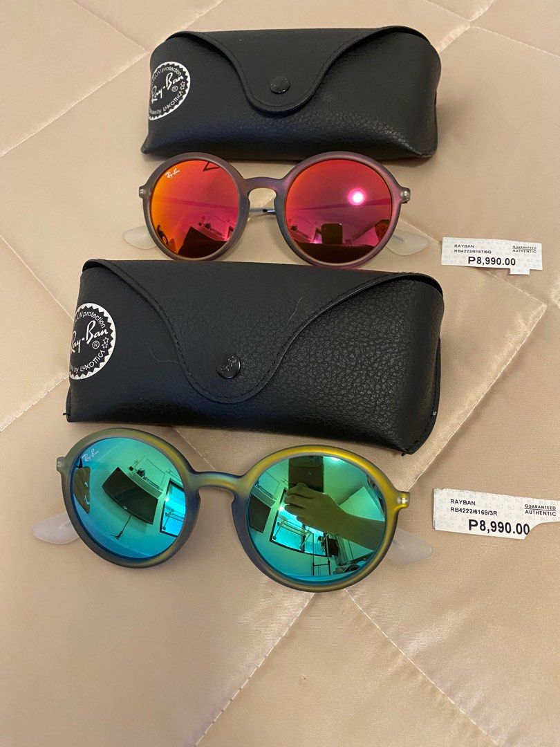 AUTHENTIC RAY-BAN YOUNGSTER ROUND (Category: Sunglasses & Eyewear) located in Davao. Submitted by bee_pee (Listing ID 1353508923, Image 1). Description: AUTHENTIC & BRANDNEW! With Case and Wiper With price tag No Box and Paperbag Bought in US during clearance sale 1. RAY-BAN RB4222/6169/3R Green Original Price: ₱8,990 2. RAY-BAN RB4222/6167/6Q Red Original Price: ₱8,990 .