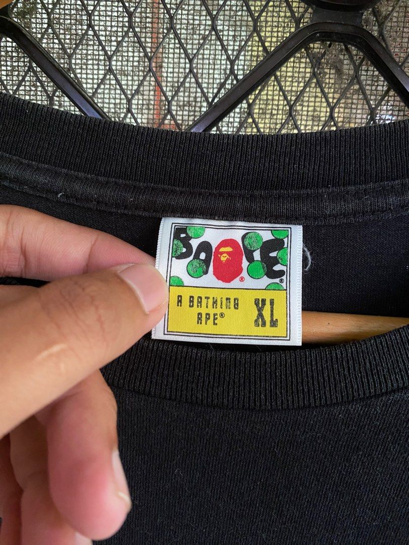BAPE COLLEGE TEE (Category: Tshirts & Polo Shirts ) located in Pinamalayan. Submitted by initialthriftstore (Listing ID 1353538327, Image 2). Description: FOR SALE‼️ Bape College Tee As new ✅ Size: XL Dimes: 27x22.5 Color Rate: 9.5/10 No issues ❌ Pm lang po sa mga interesado mga boss 🫶🏻.