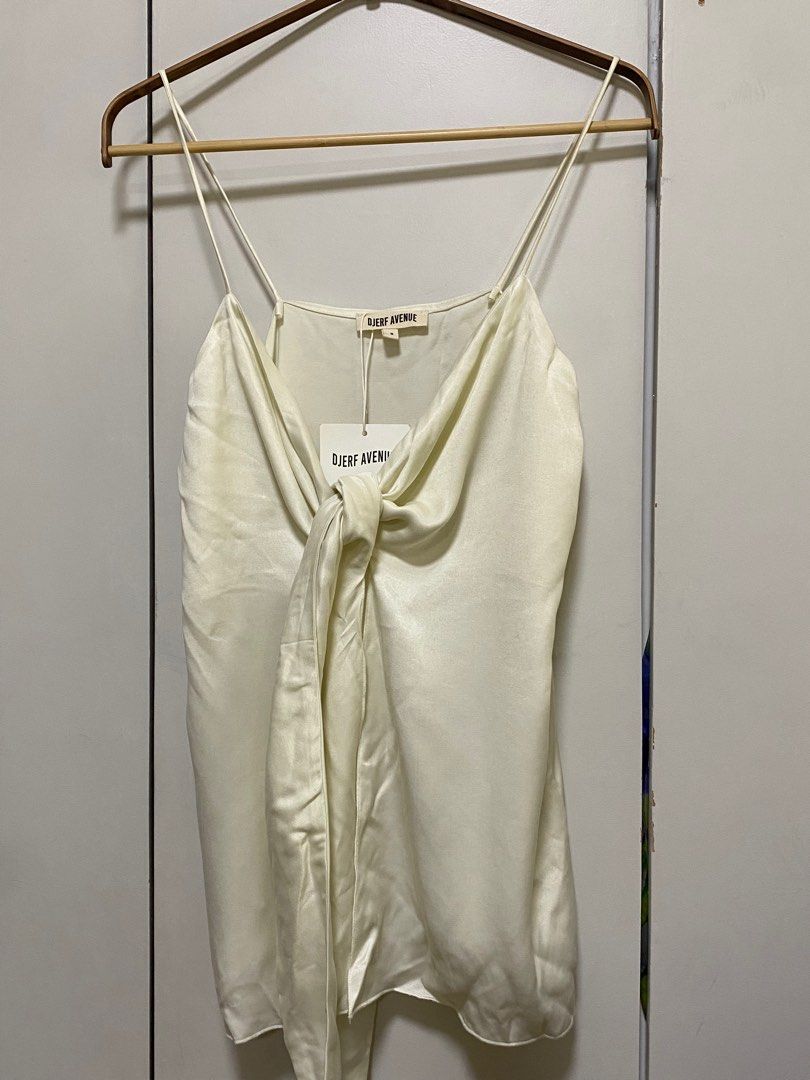 djerf avenue tie tank top (Category: Sleeveless) located in Las Pinas. Submitted by arisofro (Listing ID 1353542805, Image 3). Description: • material: cupro fabric • never worn, brand new • retails for $110 (₱6,380) .