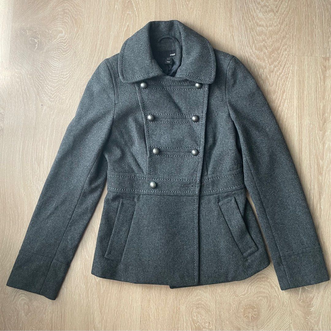 CLOSET SALE Grey Jacket (Category: Coats, Jackets and Outerwear) located in Muntinlupa City. Submitted by a.declutterer (Listing ID 1353480982, Image 1). Description: Issues: bottom right button fell off (see pics) but spare buttons are included and still attached to inside of the coat Thick and heavy. Ideal for cold/winter weather. Length: 23.5 inches RFS: Decluttering/doesnt fit me anymore.