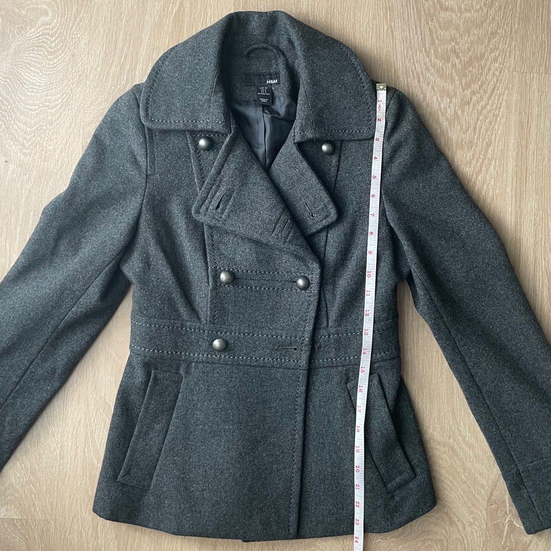 CLOSET SALE Grey Jacket (Category: Coats, Jackets and Outerwear) located in Muntinlupa City. Submitted by a.declutterer (Listing ID 1353480982, Image 3). Description: Issues: bottom right button fell off (see pics) but spare buttons are included and still attached to inside of the coat Thick and heavy. Ideal for cold/winter weather. Length: 23.5 inches RFS: Decluttering/doesnt fit me anymore.