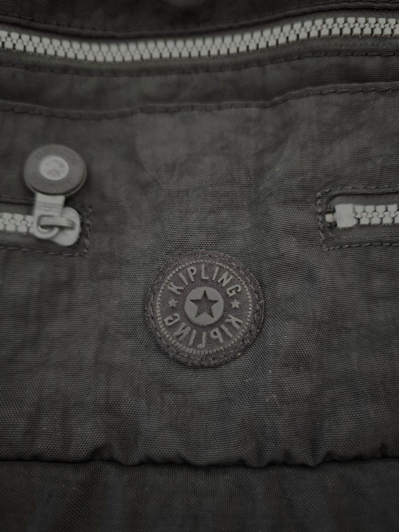 Kipling Sling Bag (Category: Cross-body Bags) located in Kuala Lumpur. Submitted by mkl_99 (Listing ID 1353434026, Image 3). Description: Kipling Sling Bag (Genuine) Main zip has been replaced.