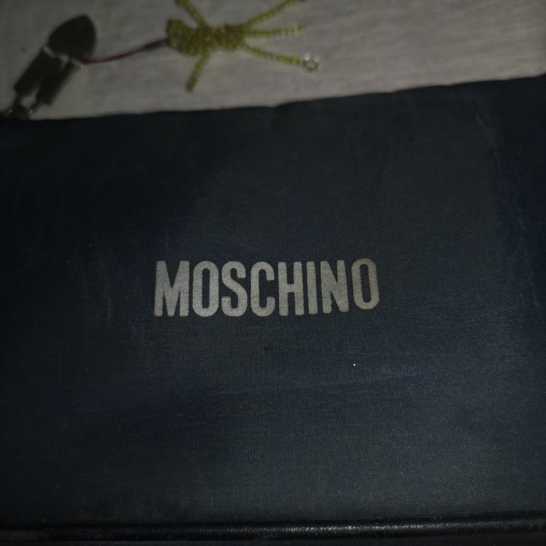 Moschino Clutch Bag (Airforce Blue) (Category: Luxury Bags & Wallets) located in General Mariano Alvarez. Submitted by hundred_lives (Listing ID 1353426513, Image 3). Description: Moschino Clutch Bag (Airforce Blue) Authentic Original Clutch/Kili-kili Type Tags: burberry fendi mcm givenchy yohji yamamoto rick owens prada dolce & gabbana channel gucci hermès balenciaga valentino ralph lauren lacoste ysl yves saint laurent bottega veneta givenchy b