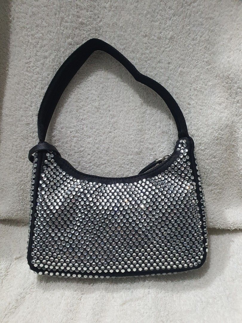 Prada crystal bag (Category: Luxury Bags & Wallets) located in Cebu City. Submitted by arceey (Listing ID 1353484755, Image 3). Description: Prada crystal re-edition can fit big phone and other daily essentials . purchased this at a live thrift seller. Rfs - declutter.