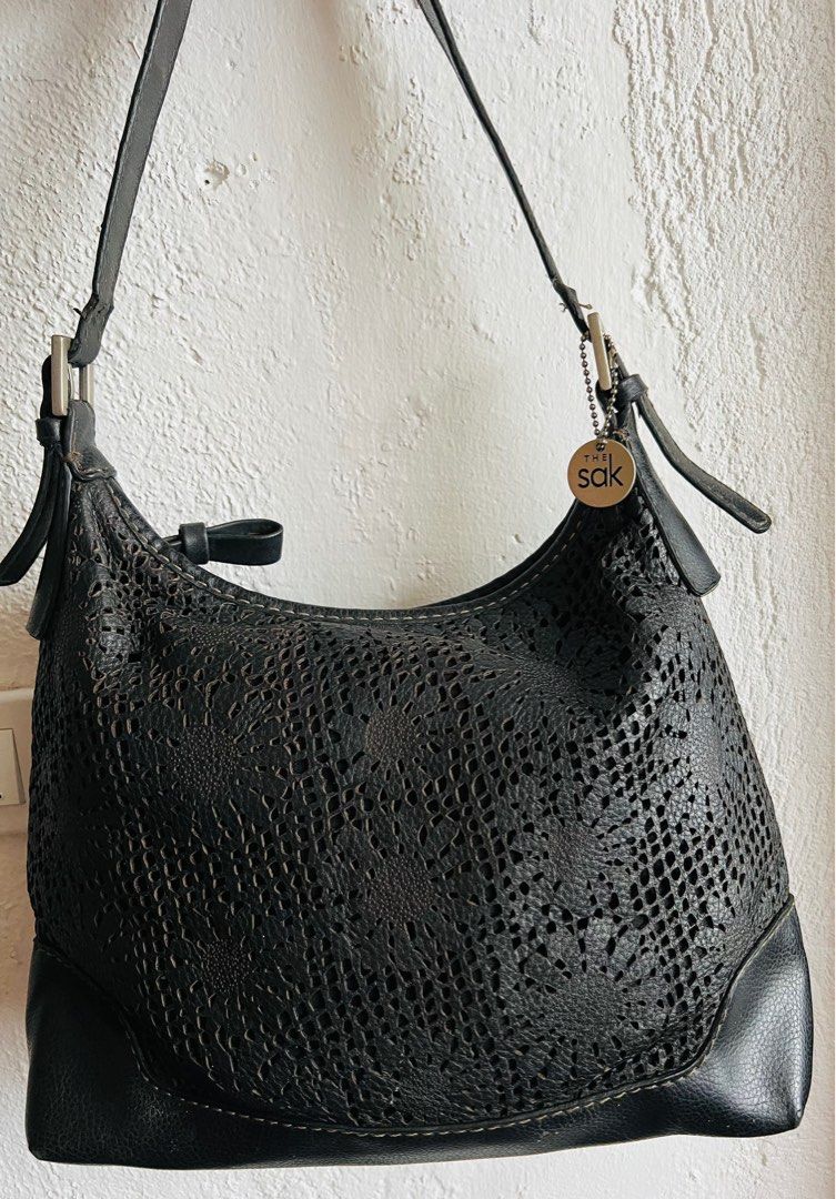 The Sak (Category: Luxury Bags & Wallets) located in Indang. Submitted by lornacmtl (Listing ID 1353439371, Image 1). Description: Original The Sak hobo bag, adjustable strap, pebbled leather, no major flaw hust sign of used. Made in china Payment thru gcash & bank transfer.