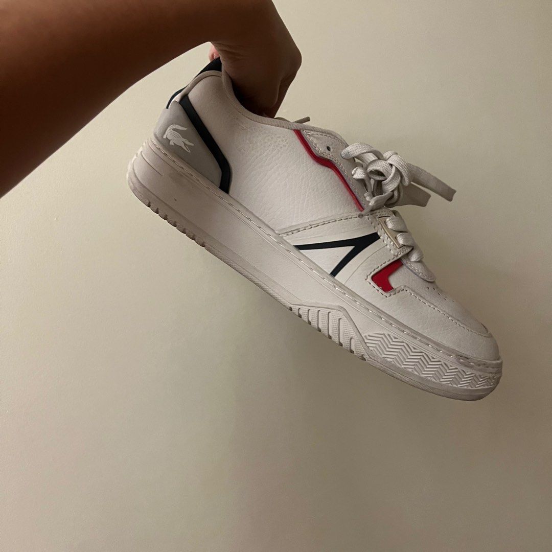 [AUTH] Lacoste Men’s Sneakers L001 (Category: Sneakers) located in Quezon City. Submitted by declutter13_ (Listing ID 1353748773, Image 3). Description: - used 4x - this is men’s UK6 Eur 39.5 USA 7 but i (she) am size 24cm and it was a bit big on me :) wore it cos i like the style doe - This brand new shoe has all the makings of a star! Dressed in white, red and navy blue, it features the timeless colors of Polo Lacoste and a leather upper. The d
