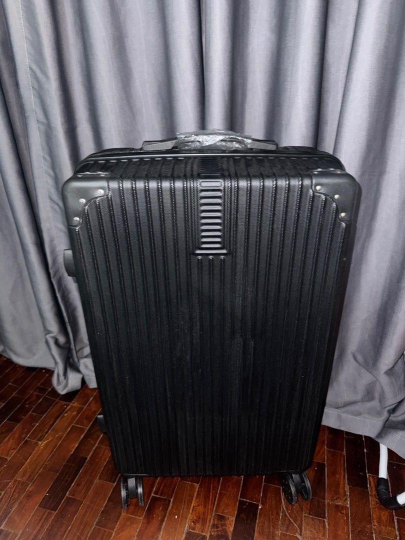 Black luggage set (Category: Luggage) located in Pasay City. Submitted by iamtrustworthy (Listing ID 1353765243, Image 2). Description: Length vertical 23inches Length diagonal 27inches Width 16inches Depth 9inches Mini luggage: 12L x 9W x 5.5D.