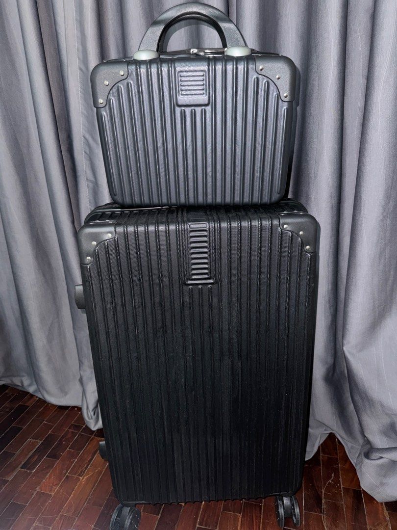 Black luggage set (Category: Luggage) located in Pasay City. Submitted by iamtrustworthy (Listing ID 1353765243, Image 1). Description: Length vertical 23inches Length diagonal 27inches Width 16inches Depth 9inches Mini luggage: 12L x 9W x 5.5D.