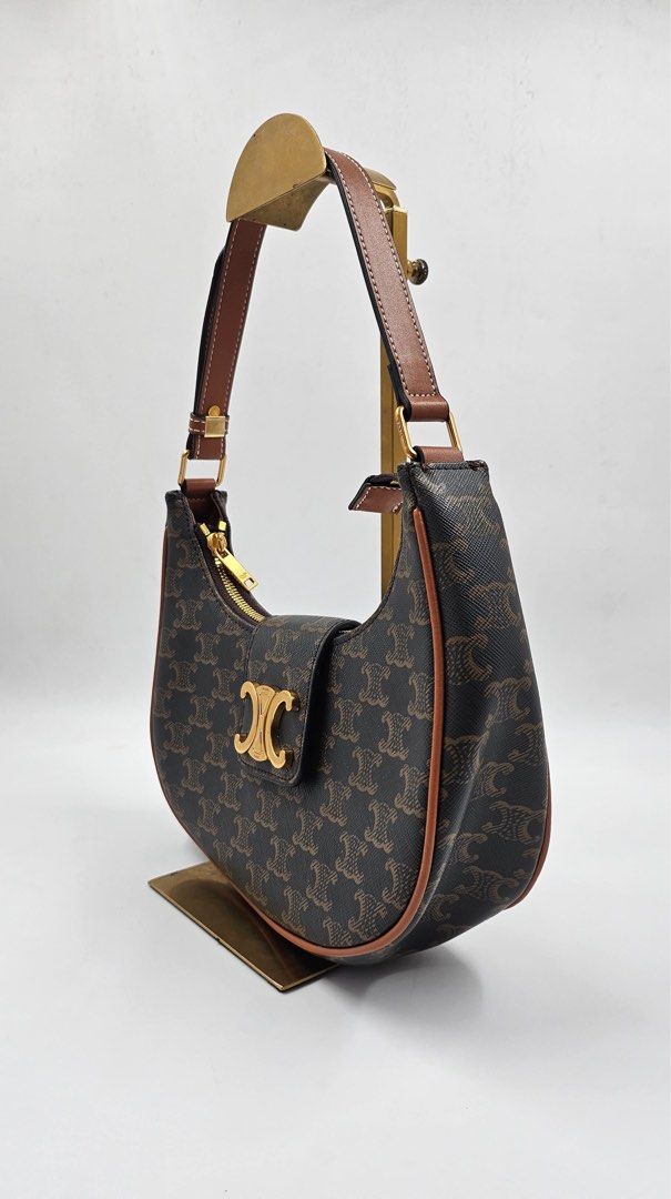 Celine Ava Triomphe Canvas Bag (Category: Luxury Bags & Wallets) located in Manila. Submitted by shopkioneph (Listing ID 1353759565, Image 2). Description: ***Japan Preloved*** Authenticity Not Guaranteed MEDIUM AVA TRIOMPHE BAG IN TRIOMPHE CANVAS AND CALFSKIN DETAILS 10 X 7 X 4 IN (24.5 X 17 X 9 CM) TRIOMPHE CANVAS, TRIMMINGS IN CALFSKIN TEXTILE LINING GOLD FINISHING SHOULDER AND HAND CARRY ZIPPED CLOSURE FLAP IN LEATHER WITH A TRIOMPHE MAGNETIC