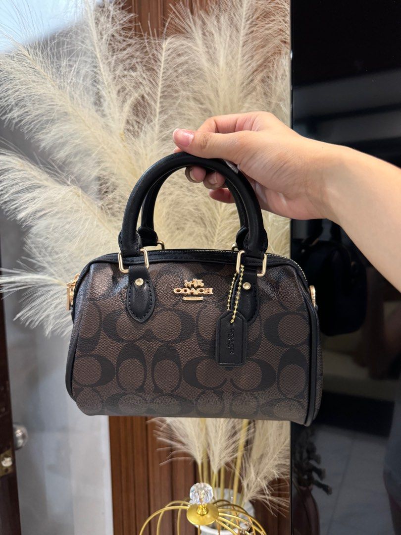Coach micro Rowan sling (Category: Luxury Bags & Wallets) located in Cavite. Submitted by luistamis (Listing ID 1353753491, Image 2). Description: With dust bag and sling// no flaws.