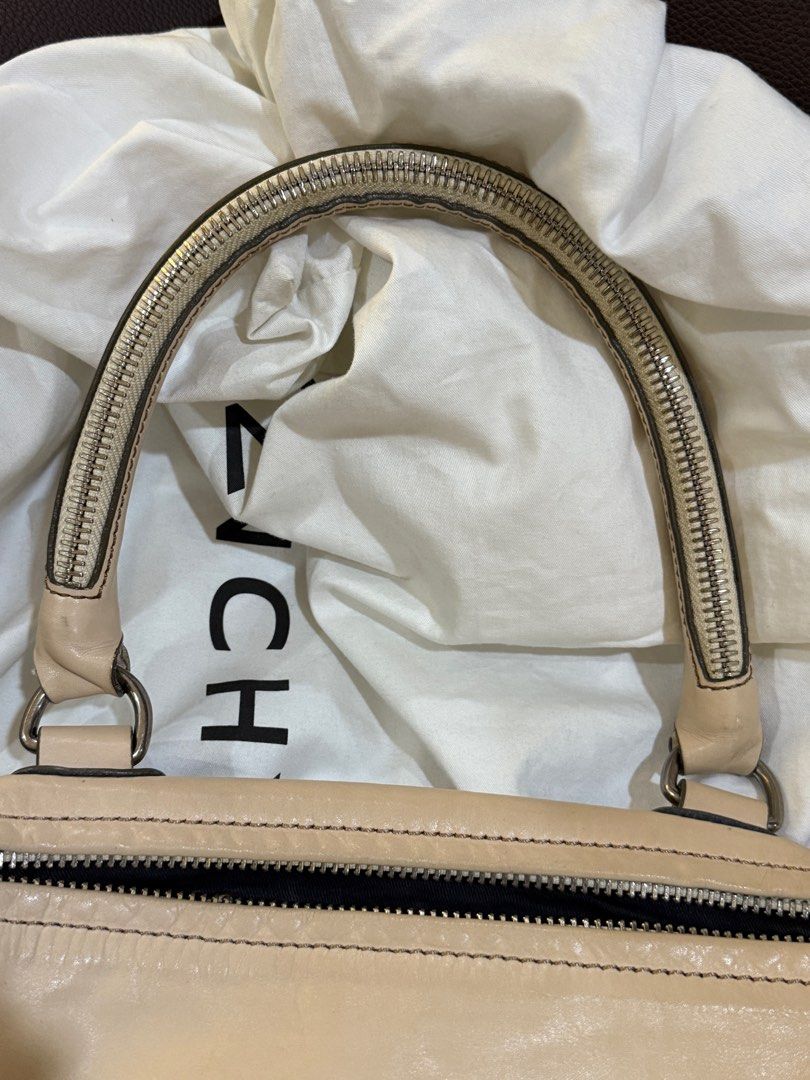 Givenchy pandora medium (Category: Luxury Bags & Wallets) located in Quezon City. Submitted by erinea (Listing ID 1353687283, Image 3). Description: Authentic givenchy pandora in medium size Bag Dust bag Legitgrails certificate No hanggling Last price posted Shipping c/o buyer Grab/lalamove ready .