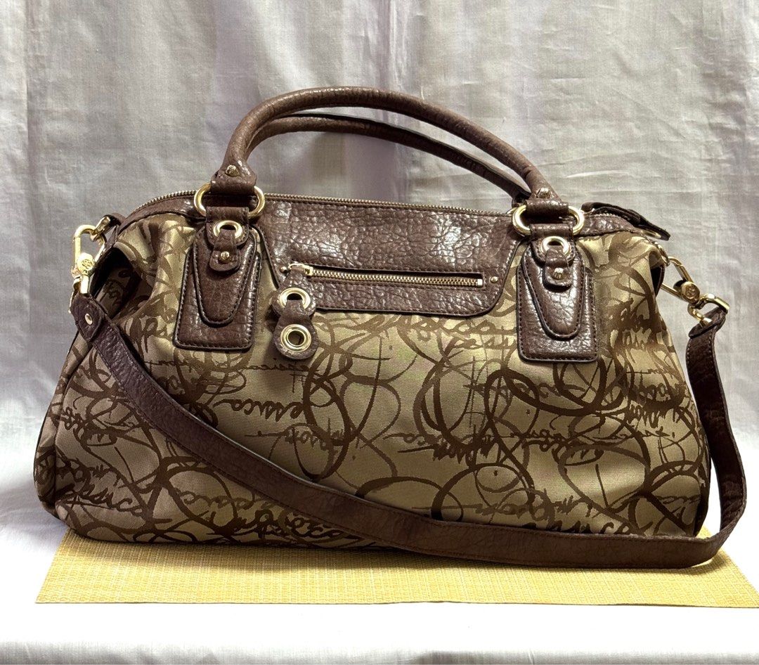 JESSICA SIMPSON 2 Way Shoulder Bag (Category: Shoulder Bags) located in Baguio. Submitted by pwz-eshop (Listing ID 1353733965, Image 3). Description: • Please make reading a habit! • I do not reserve items. I only mark items as reserved when it is paid. Paid items are shipped the next day. No shipping on holidays. • I do not have when worn pictures, please rely on actual dimensions for sizing. • Up for Grabs!! • Flaws: Rubs on leather area and st