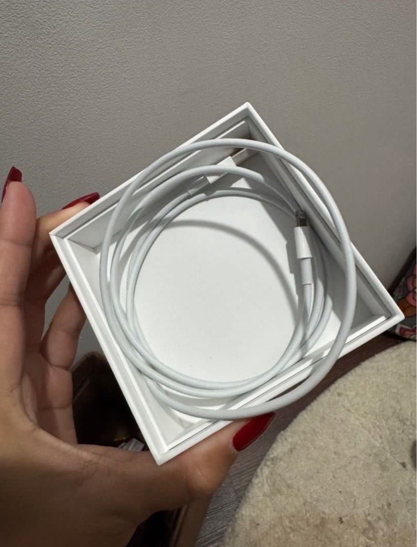 Lightning Cable to USB (Category: Cables & Adaptors) located in Quezon City. Submitted by preciousk (Listing ID 1353771795, Image 2). Description: Authentic Apple cord.