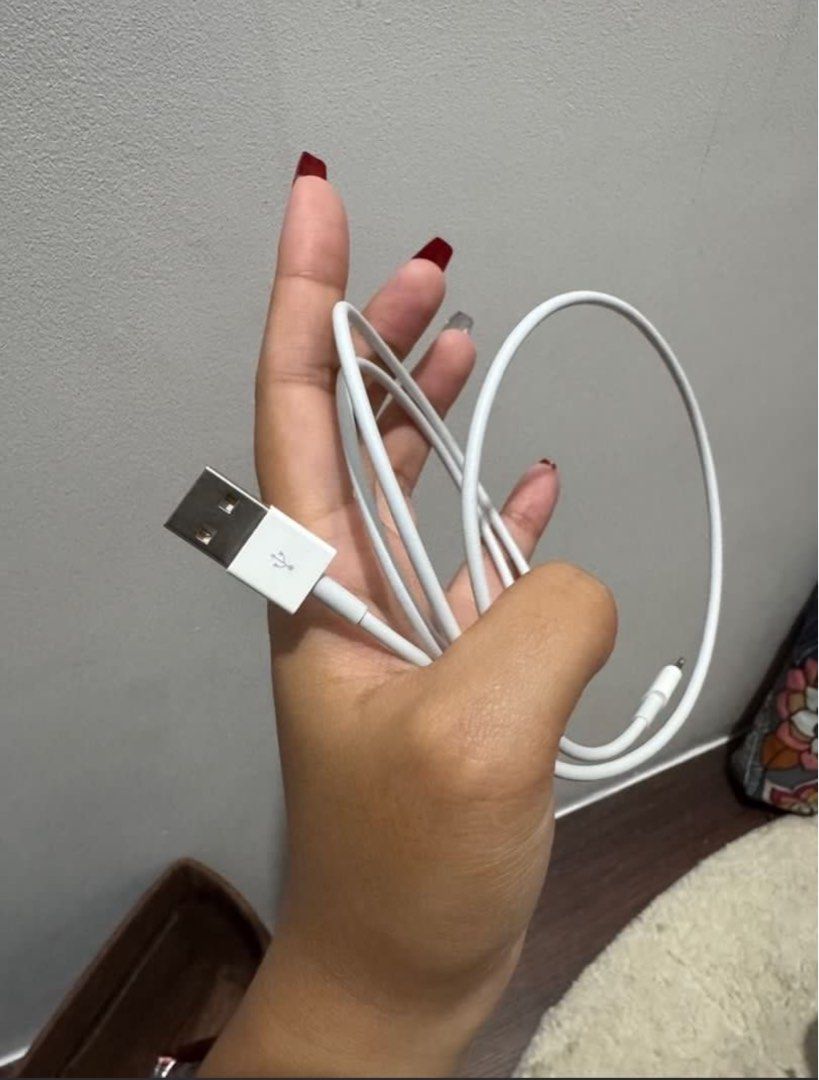 Lightning Cable to USB (Category: Cables & Adaptors) located in Quezon City. Submitted by preciousk (Listing ID 1353771795, Image 3). Description: Authentic Apple cord.