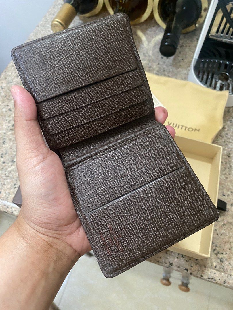 Louis Vuitton Damier Ebene Wallet (Category: Luxury Bags & Wallets) located in Quezon City. Submitted by rg1996 (Listing ID 1353614648, Image 3). Description: Lv damier ebene wallet With box, dustbag, and hot stamp receipt (no receipt for the wallet) *removed the hot stamp for selling purposes 5500 only Thanks.
