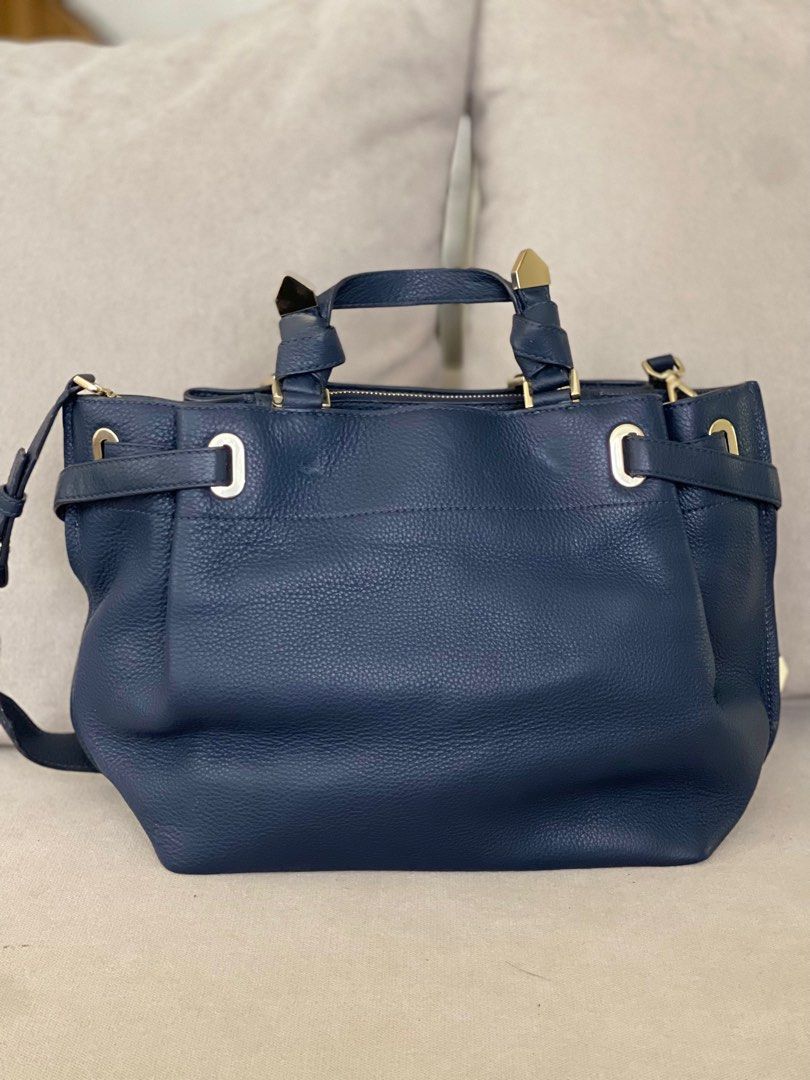 Michael Kors 2 way bag (Category: Luxury Bags & Wallets) located in Cavite. Submitted by glamupurstyle2 (Listing ID 1353668475, Image 3). Description: ₱3,199 REPRICED TO ₱2,899 MK 2 way bag Used once, then stored Gift from my sister from US. Hardware are still very shiny! Spacious and so many compartments!!! Flaws: scuffing on sling handle, some storage marks inside leather mostly are in inconspicuous parts Payment: BPI, GCASH Shipping: FLASH, J&