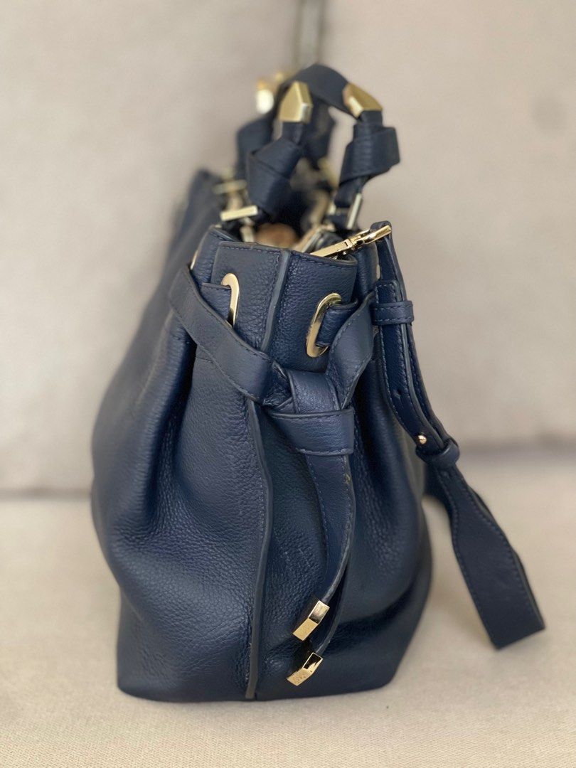 Michael Kors 2 way bag (Category: Luxury Bags & Wallets) located in Cavite. Submitted by glamupurstyle2 (Listing ID 1353668475, Image 2). Description: ₱3,199 REPRICED TO ₱2,899 MK 2 way bag Used once, then stored Gift from my sister from US. Hardware are still very shiny! Spacious and so many compartments!!! Flaws: scuffing on sling handle, some storage marks inside leather mostly are in inconspicuous parts Payment: BPI, GCASH Shipping: FLASH, J&