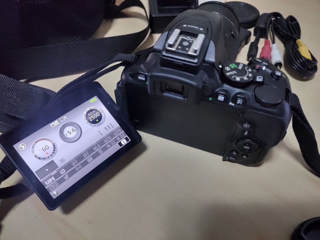 NIKON D55000 DLSR (Category: Cameras) located in Pasig City. Submitted by archer07 (Listing ID 1353622870, Image 1). Description: Complete 2 battery 1 Charger 1 Bag Like New d masyado nagagamit- nakatago lang with Bag,no Box Open for Nego.
