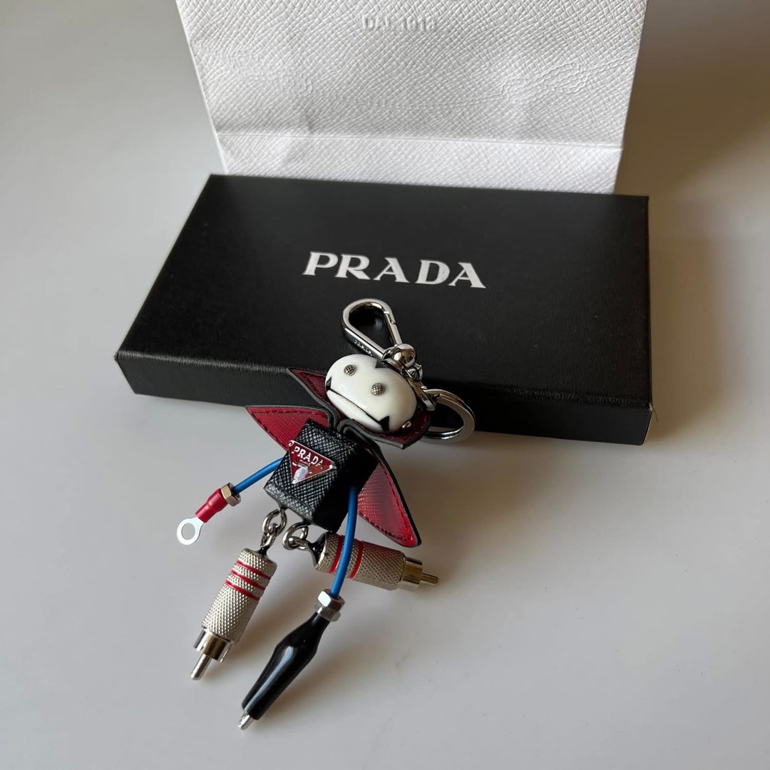 On hand prada bag charms with complete packaging, Women's Fashion, Bags ...