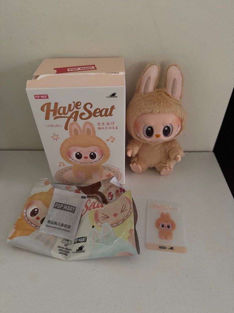 POP MART Labubu V2 Have A Seat Dada (Category: Designer & Blind Box Toys) located in San Fernando. Submitted by ms.mlsluxeboutique (Listing ID 1353700194, Image 1). Description: •100% authentic or moneyback guarantee if proven fake •Purchased from Pop Mart Store in MOA •Mild scratches in hook (see photos).