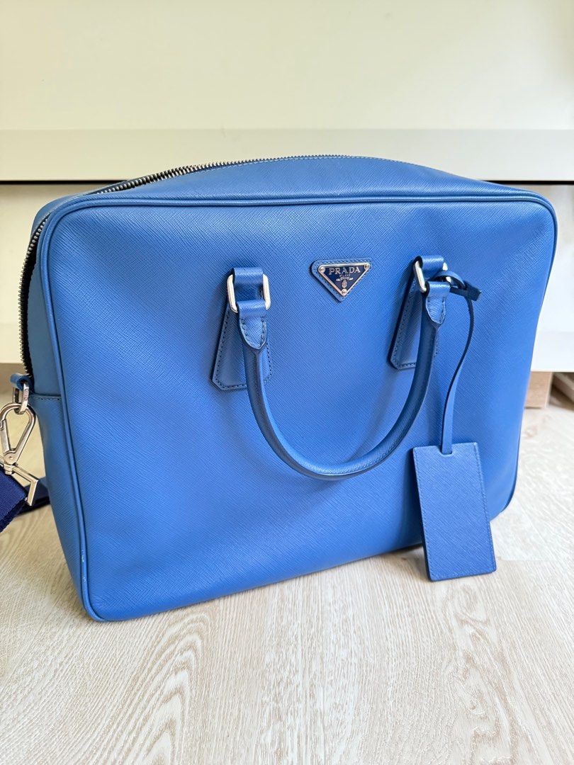 Prada saffiano sling briefcase (Category: Bags & Wallets) located in Singapore. Submitted by carluke (Listing ID 1353601981, Image 1). Description: Authentic Safianno leather .