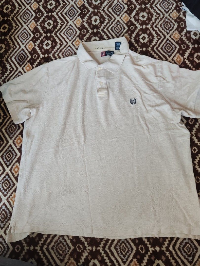 Chaps (Category: Tshirts & Polo Shirts) located in Sandakan. Submitted by risalabdrahim (Listing ID 1353733286, Image 1). Description: T-shirt Collar Chaps, Pit 25.5, Labuh 28, Condition Mantap.