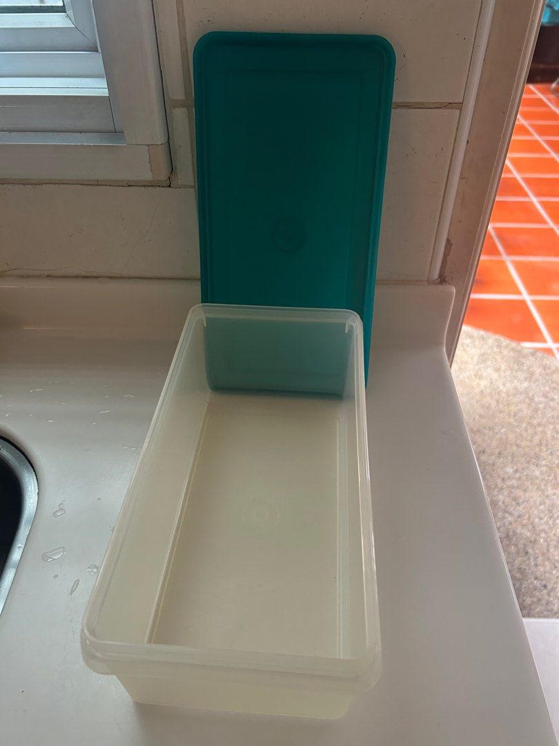 Tupperware - rectangular storage (Category: Other Kitchenware & Tableware) located in Singapore. Submitted by adnicate (Listing ID 1353697020, Image 2). Description: Dimensions 12.5 x 28cm x 9cm (H).