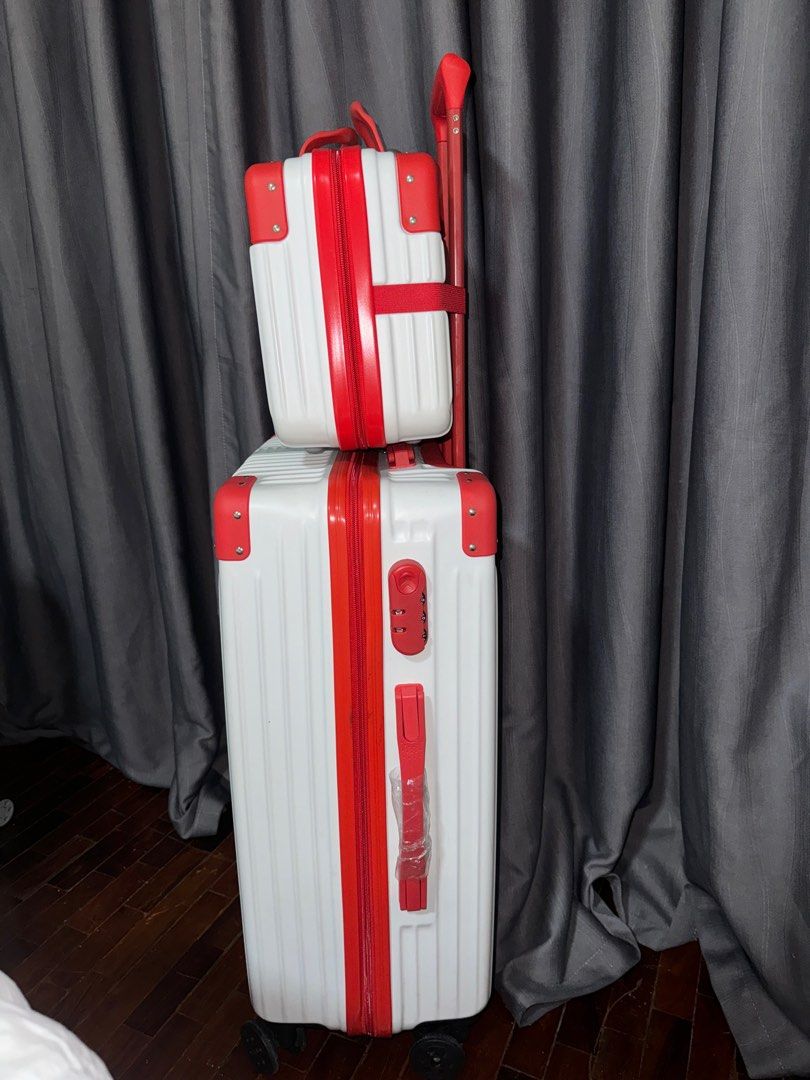 White & red luggage set (Category: Luggage) located in Pasay City. Submitted by iamtrustworthy (Listing ID 1353768038, Image 2). Description: Luggage: Length vertical 21inches Length diagonal 25inches Width 15inches Depth 9 inches Mini luggage: 12L x 9W x 5.5D inches.