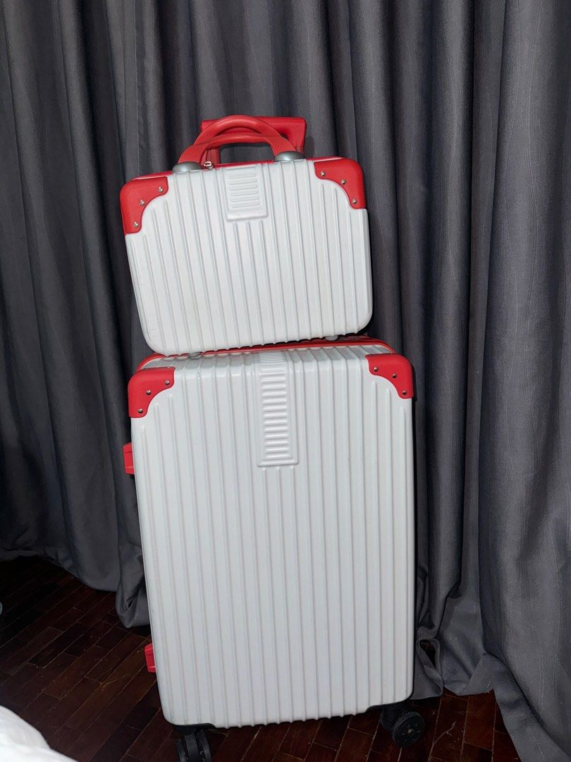 White & red luggage set (Category: Luggage) located in Pasay City. Submitted by iamtrustworthy (Listing ID 1353768038, Image 1). Description: Luggage: Length vertical 21inches Length diagonal 25inches Width 15inches Depth 9 inches Mini luggage: 12L x 9W x 5.5D inches.