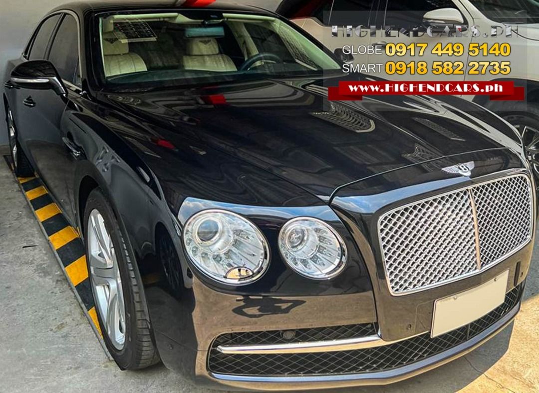 Bentley Flying Spur W12 (A) (Category: Used Cars) located in Manila. Submitted by highendcars (Listing ID 1353828309, Image 1). Description: 2014 BENTLEY FLYING SPUR W12 PGA LOCAL CALL: 09174495140 WWW.HIGHENDCARS.PH 6.0L W12 twin-turbo DOC 48-valve Eight-speed Automatic All Wheel Drive Electronic Brake Force Distribution Moonroof Woodgrain Interior Trim Heated Rear Seat Automatic/Self leveling Suspension Traction Control System Side Airbags Mile