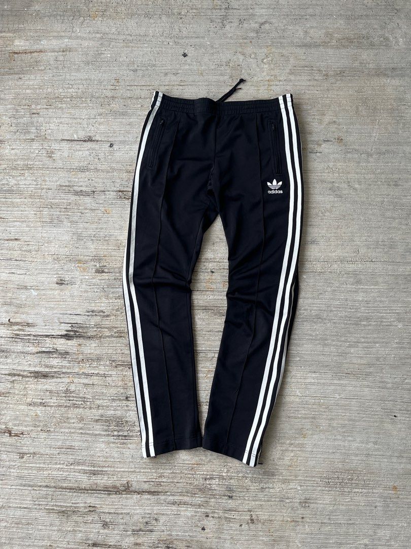 ADIDAS 3 STRIPED TRACKPANTS (Category: Joggers) located in Hulu Selangor. Submitted by zairus_ (Listing ID 1353905950, Image 2). Description: ADIDAS TRACKPANTS Size S/M Waist (30-32) inch Length (37) inch Slim fit cutting Conditon 9/10 .