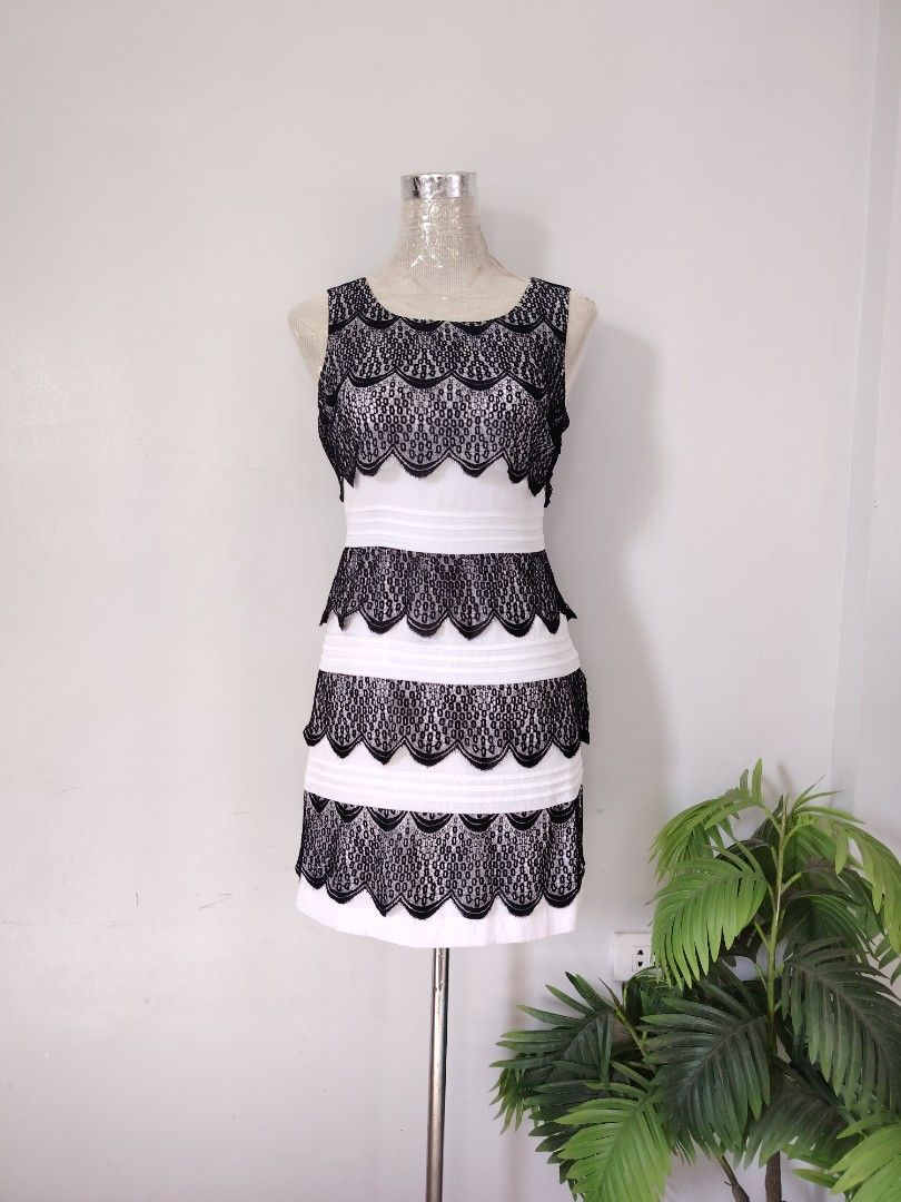 Branded BCBG layer lace cute elegant office formal event party black and white dress (Category: Dresses) located in San Marcelino. Submitted by thriftolshoppiness (Listing ID 1353832685, Image 1). Description: XS-S.