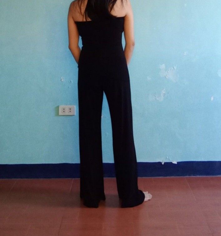 Flowy Black Jumpsuit (Category: Jumpsuits) located in Porac. Submitted by declutterwithargel (Listing ID 1353942684, Image 3). Description: Fits small to medium Super nice quality Model height is 5 flat Perfect for casual days or even events Super comfy and stretchy material.