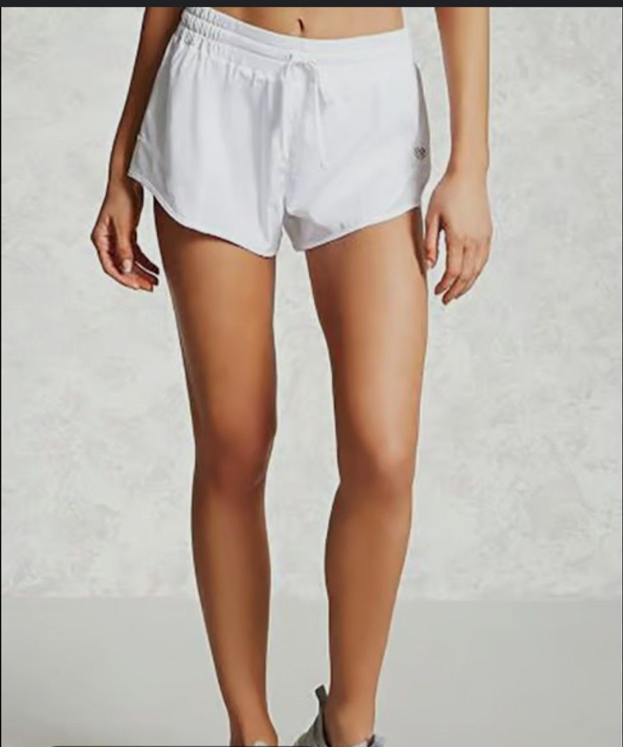 Forever 21 active wear running shorts (Category: Activewear) located in General Santos City (Dadiangas). Submitted by samarey (Listing ID 1353799239, Image 1). Description: has a slight issue on the inner thigh part of the shorts. pls see the last pic..
