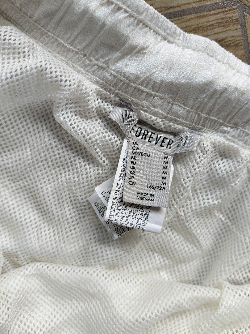 Forever 21 active wear running shorts (Category: Activewear) located in General Santos City (Dadiangas). Submitted by samarey (Listing ID 1353799239, Image 3). Description: has a slight issue on the inner thigh part of the shorts. pls see the last pic..