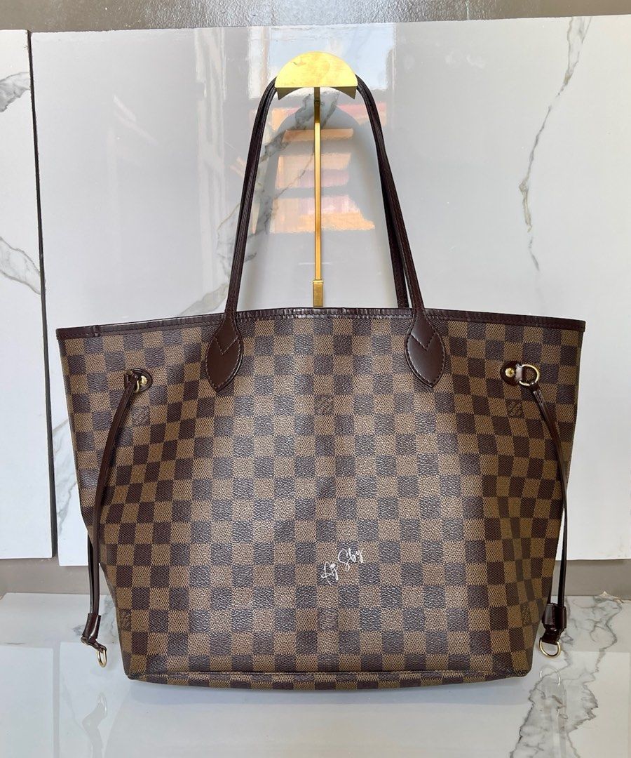 Louis Vuitton Neverfull in Damier Ebene MM (Category: Luxury Bags & Wallets) located in Cagayan de Oro. Submitted by theclassictrunk (Listing ID 1353882663, Image 1). Description: Guaranteed original No flaws, only signs of usage. .