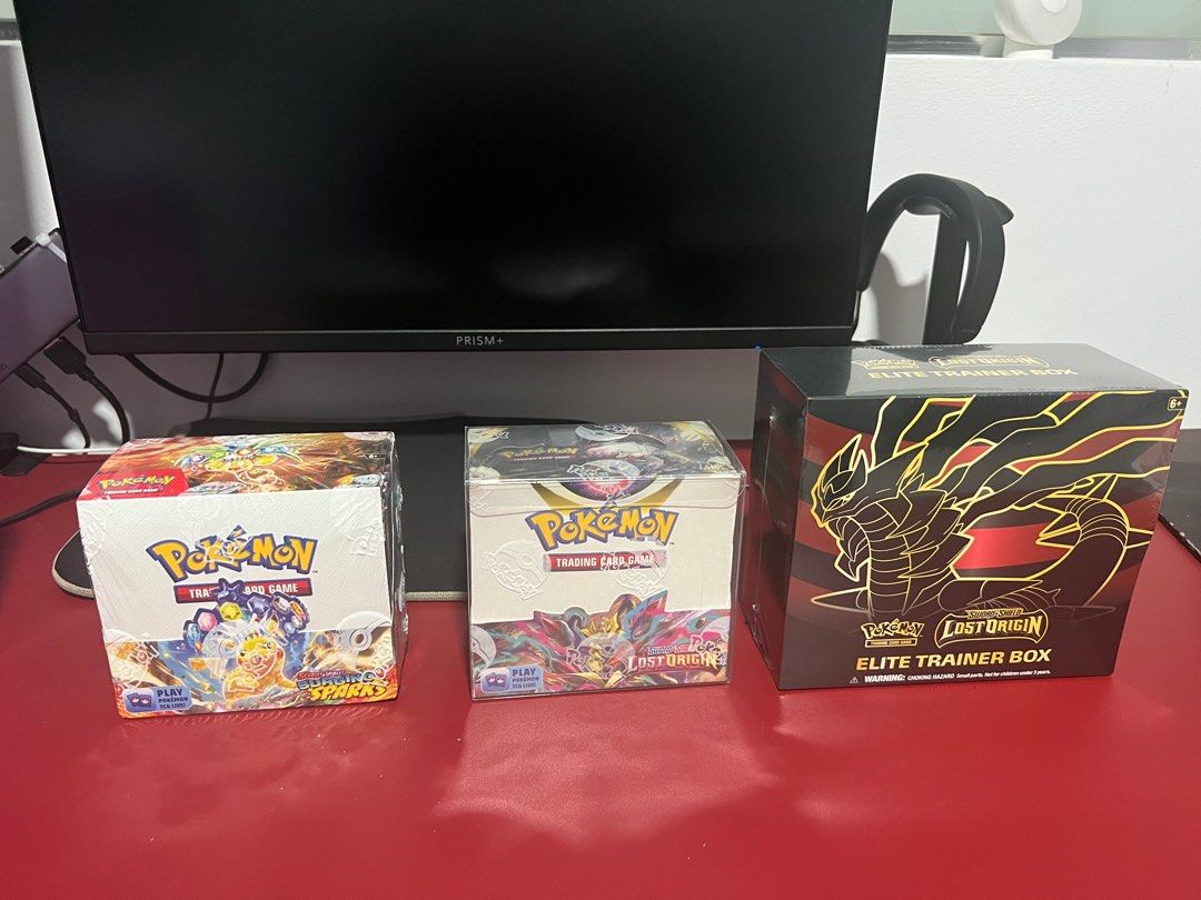 Pokemon Lost Origin Booster box + ETB, Surging Sparks Booster box ...
