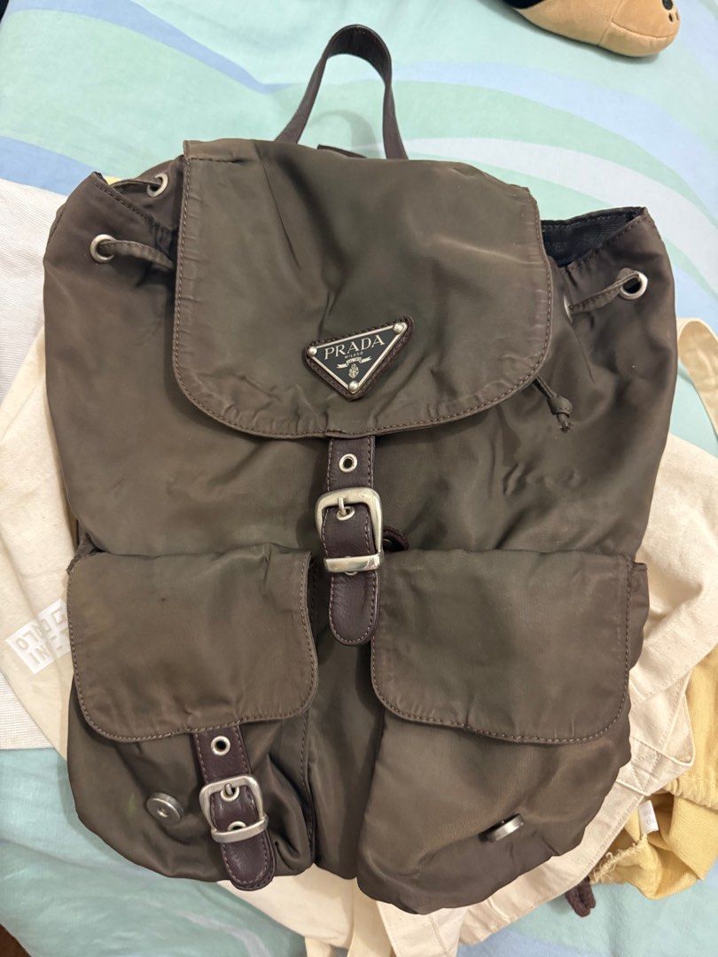 Prada backpack (Category: Luxury Bags & Wallets) located in Taguig. Submitted by cams_declutter (Listing ID 1353895505, Image 1). Description: Prada backpack Heavily used Missing lock Please check photos .