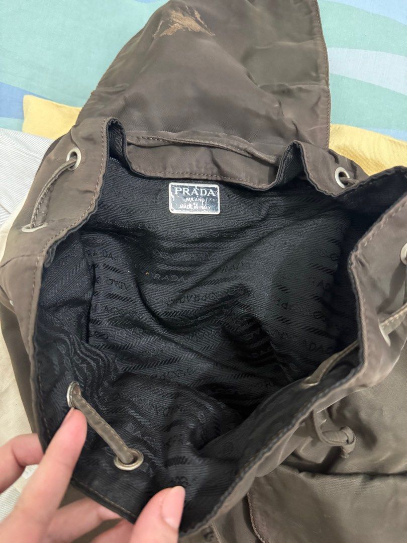 Prada backpack (Category: Luxury Bags & Wallets) located in Taguig. Submitted by cams_declutter (Listing ID 1353895505, Image 3). Description: Prada backpack Heavily used Missing lock Please check photos .