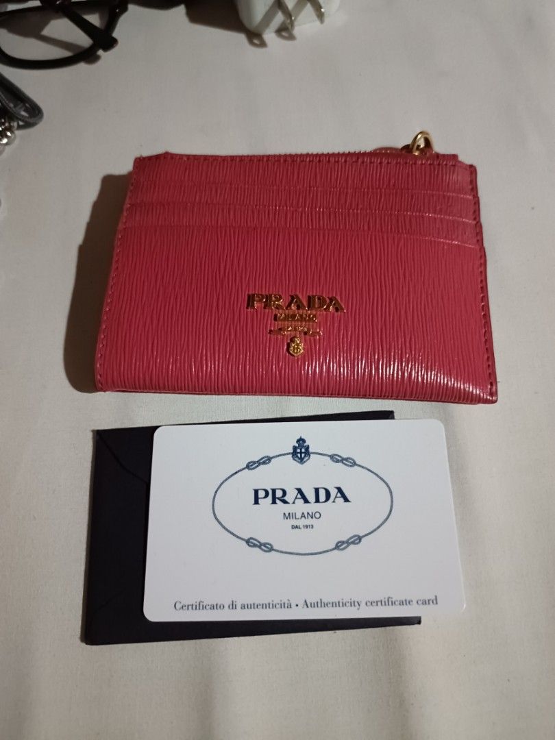 Prada Vitello (Category: Luxury Bags & Wallets) located in Makati City. Submitted by blessedlupie (Listing ID 1353855962, Image 3). Description: slight chipping on the folded area of wallet not visible.