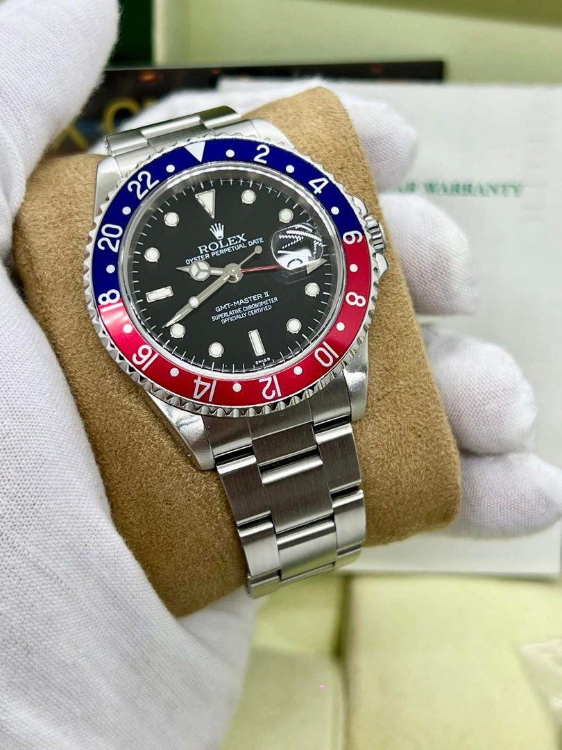 rolex pepsi (Category: Luxury Watches) located in Cabanatuan. Submitted by albertgonzales27 (Listing ID 1353935994, Image 1). Description: GMT Master II Pepsi Reference 16710 2000 year model, Foreign AD 40mm case size Swiss only dial / Luminova Double flip lock 9/10 pristine condition (Unpolished) Box and papers, 12 links Trades accepted up or down P749k only.