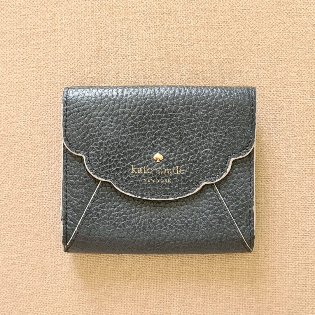 Authentic Kate Spade Bifold Wallet (Category: Luxury Bags & Wallets) located in Manila. Submitted by daintydane (Listing ID 1350781739, Image 1). Description: Still in good condition. Logo is slightly faded. Normal signs of use. With Coin Compartment. Pebbled Leather. ✅ mode of payment: BPI, Paymaya, GCash ✅ shipping via lalamove/grab for metro manila and gogo xpress for provinces. sf shouldered by buyer..