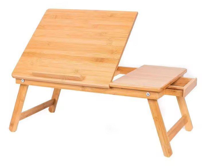 Bamboo Laptop Desk Bed Table (Category: Tables & Sets) located in Muntinlupa City. Submitted by socuteshop (Listing ID 1350795295, Image 1). Description: ✅ perfect for bedside working with laptop ✅ adjustable angle ✅ with drawer About seller: ‼️delivery only, no meet-ups ‼️buyer shoulders sf ‼️based in Muntinlupa ‼️MOP: Gcash, COD (with DP).